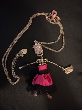 Betsey Johnson Gold-Tone Doll Necklace with Fuchsia & Black Dress